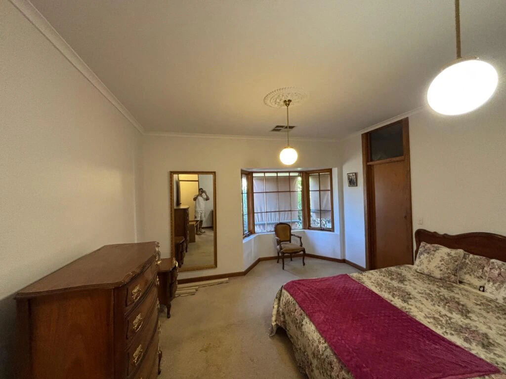 Professional residential interior painters painting walls in an Adelaide home