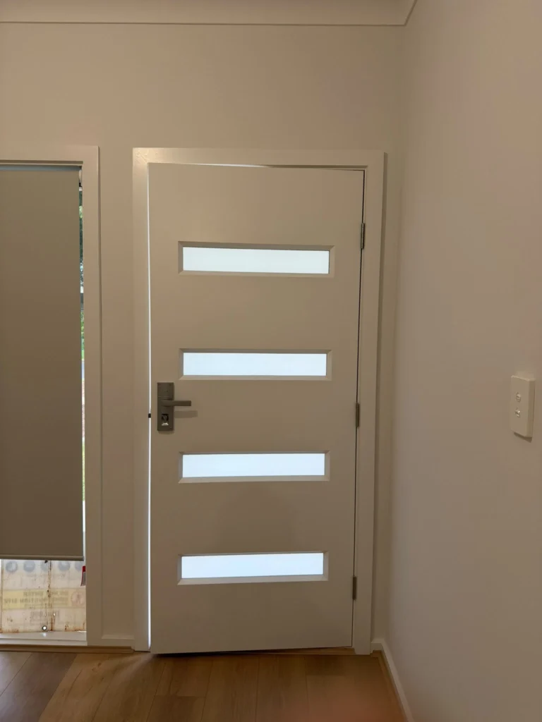 Professional interior painters painting walls in an Adelaide home