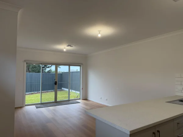 Professional interior painters applying paint to walls in an Adelaide home