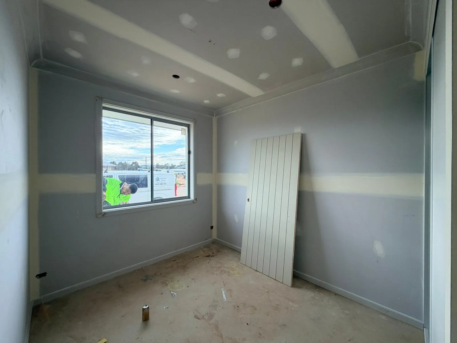 Interior room prepared for professional painting before applying a new paint finish in Adelaide.